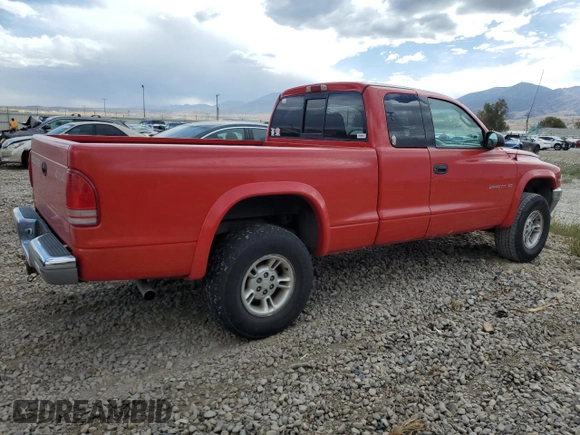 1999 Dodge Dakota SLT with VIN 1B7GG22X7XS101535, listed as a Copart auction lot 71592334 with 151,644 mi miles and Salvage Title. Bid and sale history available at DreamBid. Image 3.