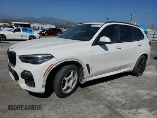 2021 BMW X5 sDrive40i with VIN 5UXCR4C0XM9F63744, listed as a Copart auction lot 57341645 with 102,285 mi miles and Salvage title. Bid and sale history available at DreamBid. Image 1.