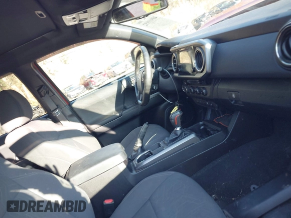 2016 Toyota Tacoma SR with VIN 3TMCZ5AN6GM009576, listed as a IAAI auction lot 40911932 with Not Provided miles and . Bid and sale history available at DreamBid. Image 5.