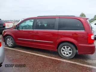 2012 Chrysler Town & Country Touring with VIN 2C4RC1BG8CR344068, listed as a IAAI auction lot 41970494 with 130,559 mi miles. Bid and sale history available at carsss.com. Image 14.