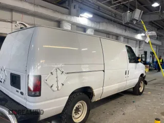 2010 Ford Econoline Cargo Commercial with VIN 1FTNE1EW1ADA90764, listed as a IAAI auction lot 42608095 with 146,335 mi miles and . Bid and sale history available at DreamBid. Image 61.