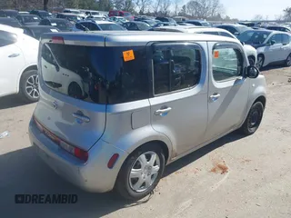2009 Nissan Cube SL z VIN JN8AZ28RX9T126052, wystawiony jako IAAI lot #41446606 z przebiegiem 246 413 mil mil oraz . Historia ofert i sprzedaży dostępna na DreamBid. Obrazek 4.