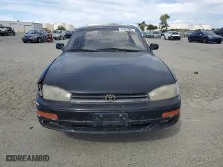 1993 Toyota Camry LE with VIN JT2SK12E4P0112014, listed as a Copart auction lot 52822095 with 249,458 mi miles and Salvage Title. Bid and sale history available at carsss.com. Image 5.