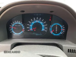 2010 Ford Fusion SE z VIN 3FAHP0HA0AR335424, wystawiony jako Copart lot #58853845 z przebiegiem 168 793 mil mil oraz Szkoda całkowita • Salvage title. Historia ofert i sprzedaży dostępna na DreamBid. Obrazek 9.