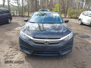 2018 Honda Civic EX with VIN 2HGFC2F75JH528486, listed as a IAAI auction lot 41869983 with 95,614 mi miles and . Bid and sale history available at DreamBid. Image 12.