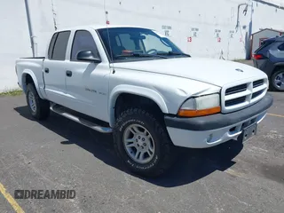 2002 Dodge Dakota Sport с VIN 1B7HG38N42S709487, выставлен на аукционе IAAI как лот 42820462 с пробегом 165 695 миль миль и . История ставок и продаж доступна на DreamBid. Изображение 1.