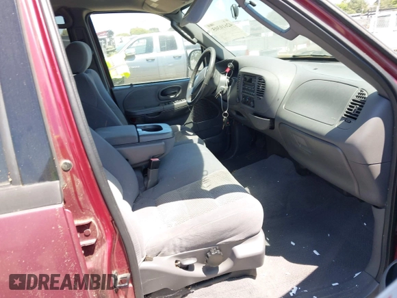 2003 Ford F-150 XLT with VIN 1FTRW08L63KA20475, listed as a IAAI auction lot 42610305 with Not provided miles and . Bid and sale history available at DreamBid. Image 5.