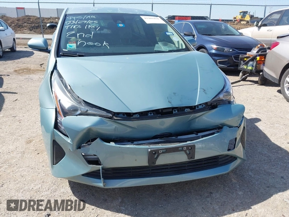 2018 Toyota Prius Two with VIN JTDKBRFU3J3068729, listed as a IAAI auction lot 41989450 with 192,848 mi miles and . Bid and sale history available at DreamBid. Image 12.