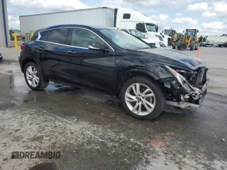 2018 Infiniti QX30 Luxury z VIN SJKCH5CP2JA051648, wystawiony jako Copart lot #52361895 z przebiegiem 90 717 mil mil oraz Szkody całkowita. Historia ofert i sprzedaży dostępna na DreamBid. Obrazek 4.