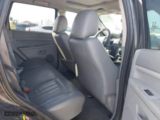 2005 Jeep Grand Cherokee Laredo with VIN 1J8GS48K95C615330, listed as a IAAI auction lot 41719101 with 152,186 mi miles. Bid and sale history available at carsss.com. Image 8.