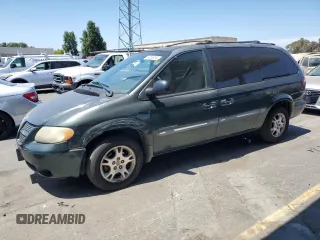 2001 Dodge Caravan Sport with VIN 2B8GP44G31R148820, listed as a Copart auction lot 64069494 with 70,125 mi miles and Salvage Title. Bid and sale history available at carsss.com. Image 1.