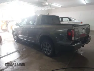 2020 Honda Ridgeline RTL-E with VIN 5FPYK3F75LB001516, listed as a IAAI auction lot 41605859 with 93,902 mi miles and . Bid and sale history available at DreamBid. Image 3.