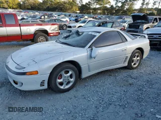 1993 Mitsubishi 3000GT z VIN JA3BM64J4PY006154, wystawiony jako Copart lot #76087934 z przebiegiem 135 641 mil mil oraz Szkody całkowita. Historia ofert i sprzedaży dostępna na DreamBid. Obrazek 1.