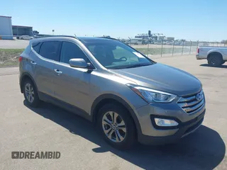 2014 Hyundai Santa Fe z VIN 5XYZUDLBXEG138517, wystawiony jako IAAI lot #42156292 z przebiegiem 161 043 mil mil oraz . Historia ofert i sprzedaży dostępna na DreamBid. Obrazek 1.