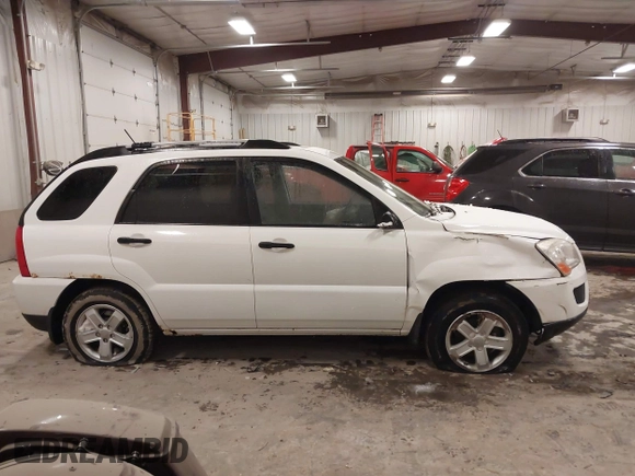 2010 Kia Sportage LX with VIN KNDKGCA35A7718764, listed as a IAAI auction lot 41512368 with 122,420 mi miles and . Bid and sale history available at carsss.com. Image 13.