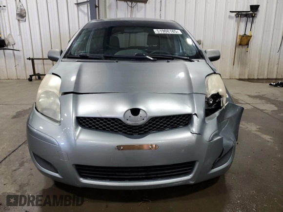2009 Toyota Yaris with VIN JTDKT903X95231860, listed as a Copart auction lot 51908185 with 135,701 mi miles and Salvage Title. Bid and sale history available at carsss.com. Image 5.