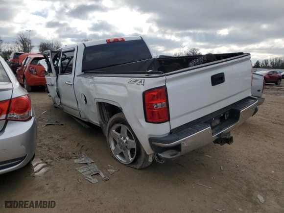 2015 GMC Sierra 2500HD available WiFi SLT with VIN 1GT12ZE86FF660390, listed as a Copart auction lot 82518914 with 0 mi miles and Salvage Title. Bid and sale history available at carsss.com. Image 2.