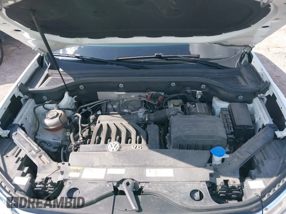2021 Volkswagen Atlas SE z VIN 1V2WR2CA9MC585700, wystawiony jako IAAI lot #42234502 z przebiegiem 46 040 mil mil oraz . Historia ofert i sprzedaży dostępna na DreamBid. Obrazek 10.