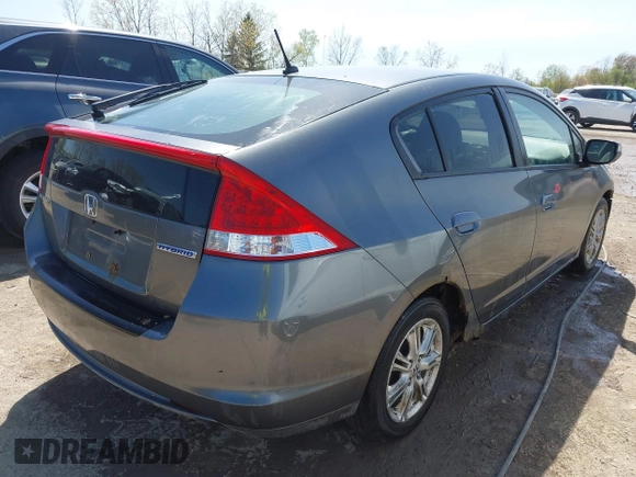 2010 Honda Insight EX with VIN JHMZE2H75AS008489, listed as a IAAI auction lot 42124780 with 226,100 mi miles and . Bid and sale history available at DreamBid. Image 4.