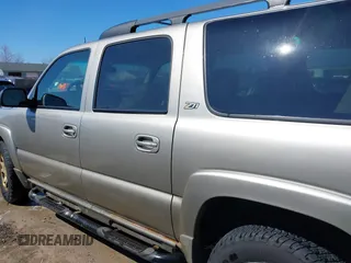 2003 Chevrolet Suburban Z71 with VIN 3GNFK16Z33G253479, listed as a IAAI auction lot 41871504 with 157,990 mi miles and . Bid and sale history available at DreamBid. Image 14.