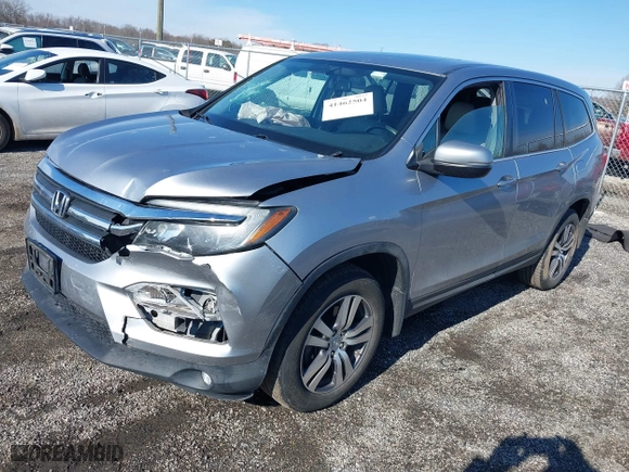 2016 Honda Pilot EX-L with VIN 5FNYF6H50GB092999, listed as a IAAI auction lot 41462504 with 141,604 mi miles. Bid and sale history available at carsss.com. Image 17.