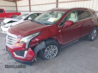 2017 Cadillac XT5 Luxury AWD with VIN 1GYKNDRS5HZ265570, listed as a IAAI auction lot 41915115 with 96,493 mi miles and . Bid and sale history available at DreamBid. Image 2.