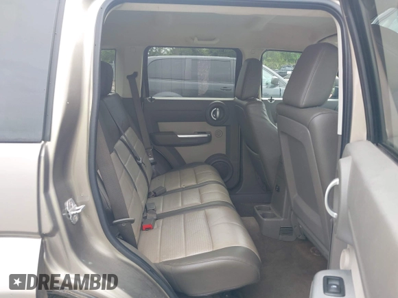 2007 Dodge Nitro SLT z VIN 1D8GT58K07W735904, wystawiony jako IAAI lot #42216665 z przebiegiem 168 000 mil mil oraz . Historia ofert i sprzedaży dostępna na DreamBid. Obrazek 8.