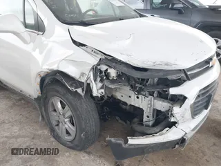 2020 Chevrolet Trax LT with VIN KL7CJLSBXLB010793, listed as a IAAI auction lot 41704879 with 124,915 mi miles and . Bid and sale history available at DreamBid. Image 6.