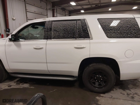 2018 Chevrolet Tahoe Commercial with VIN 1GNSKDEC1JR240868, listed as a IAAI auction lot 41608806 with 138,126 mi miles. Bid and sale history available at carsss.com. Image 14.