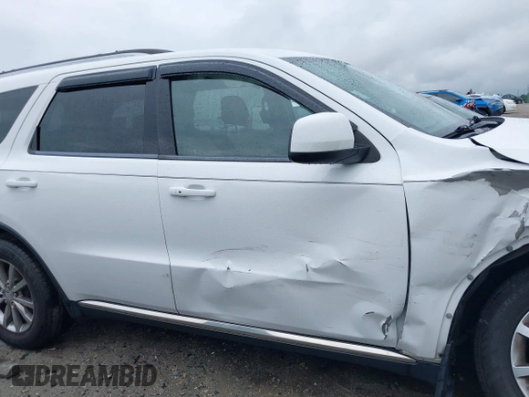 2018 Dodge Durango SXT z VIN 1C4RDHAG9JC359496, wystawiony jako IAAI lot #42435401 z przebiegiem 162 391 mil mil oraz . Historia ofert i sprzedaży dostępna na DreamBid. Obrazek 13.