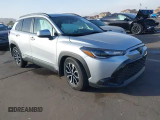 2023 Toyota Corolla Cross Hybrid S with VIN 7MUFBABG8PV011345, listed as a IAAI auction lot 41286619 with 13,518 mi miles and . Bid and sale history available at DreamBid. Image 1.