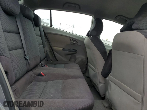 2010 Honda Insight EX with VIN JHMZE2H79AS017647, listed as a Copart auction lot 53311325 with 94,999 mi miles and Salvage Title. Bid and sale history available at DreamBid. Image 11.