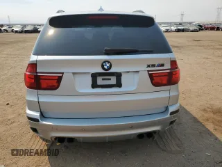2011 BMW X5 M with VIN 5YMGY0C58BLK26357, listed as a Copart auction lot 71443774 with 116,973 mi miles and Salvage Title. Bid and sale history available at carsss.com. Image 6.