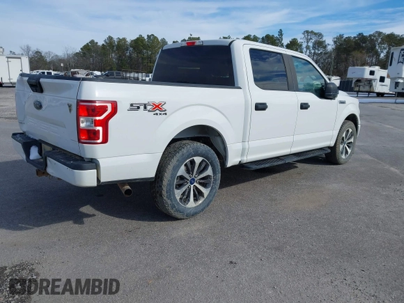 2019 Ford F-150 XL with VIN 1FTEW1E51KFC52807, listed as a IAAI auction lot 41383212 with 124,244 mi miles and . Bid and sale history available at DreamBid. Image 4.