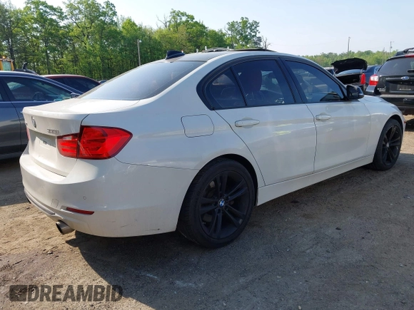 2013 BMW 3 Series 335i xDrive with VIN WBA3B9C54DF587421, listed as a IAAI auction lot 42165857 with 142,331 mi miles. Bid and sale history available at carsss.com. Image 4.