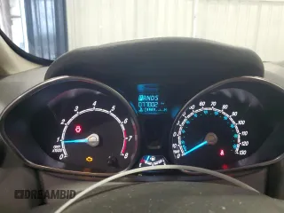 2019 Ford Fiesta SE z VIN 3FADP4BJ9KM151046, wystawiony jako Copart lot #56862255 z przebiegiem 77 002 mil mil oraz Tytuł czysty. Historia ofert i sprzedaży dostępna na DreamBid. Obrazek 9.