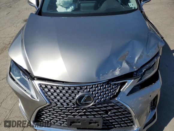 2022 Lexus RX 350 z VIN 2T2HZMDA9NC309753, wystawiony jako Copart lot #62212495 z przebiegiem 20 199 mil mil oraz Szkoda całkowita • Salvage title. Historia ofert i sprzedaży dostępna na DreamBid. Obrazek 12.