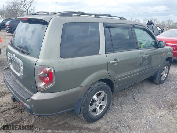 2007 Honda Pilot EX-L with VIN 5FNYF28617B039309, listed as a IAAI auction lot 41951978 with 239,583 mi miles. Bid and sale history available at carsss.com. Image 4.
