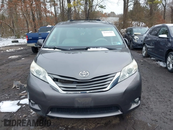 2012 Toyota Sienna XLE with VIN 5TDDK3DC9CS047014, listed as a IAAI auction lot 41551585 with 164,440 mi miles. Bid and sale history available at carsss.com. Image 12.