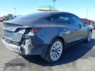 2023 Tesla Model 3 with VIN 5YJ3E1EA2PF640289, listed as a IAAI auction lot 42000200 with 14,194 mi miles and . Bid and sale history available at DreamBid. Image 4.