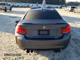 2018 BMW M2 z VIN WBS1J5C50J7B70191, wystawiony jako Copart lot #86976284 z przebiegiem Nie podano mil oraz Szkoda całkowita • Salvage title. Historia ofert i sprzedaży dostępna na DreamBid. Obrazek 6.