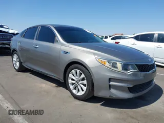 2016 Kia Optima LX z VIN 5XXGT4L39GG069586, wystawiony jako IAAI lot #42302770 z przebiegiem 228 039 mil mil oraz . Historia ofert i sprzedaży dostępna na DreamBid. Obrazek 1.