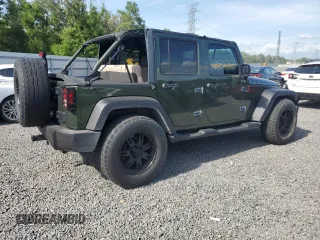 2008 Jeep Wrangler Unlimited X with VIN 1J4GB39108L608465, listed as a Copart auction lot 50949015 with 103,205 mi miles and Salvage Title. Bid and sale history available at DreamBid. Image 3.