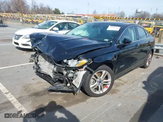 2016 Ford Fusion Energi Titanium with VIN 3FA6P0SU5GR401632, listed as a IAAI auction lot 41540328 with 116,087 mi miles. Bid and sale history available at carsss.com. Image 17.