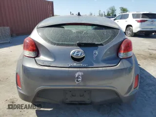 2012 Hyundai Veloster w/Black Int z VIN KMHTC6AD4CU046609, wystawiony jako Copart lot #54888045 z przebiegiem 152 997 mil mil oraz Szkoda całkowita • Salvage title. Historia ofert i sprzedaży dostępna na DreamBid. Obrazek 6.