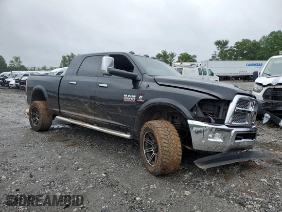 2016 Ram 2500 Laramie with VIN 3C6UR5NL0GG167365, listed as a Copart auction lot 56641725 with 130,401 mi miles and Salvage title. Bid and sale history available at DreamBid. Image 4.