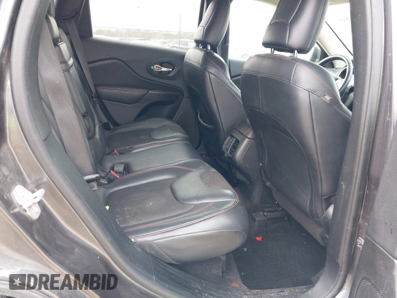 2016 Jeep Cherokee Trailhawk z VIN 1C4PJMBS4GW167650, wystawiony jako IAAI lot #41936549 z przebiegiem 218 000 mil mil oraz . Historia ofert i sprzedaży dostępna na DreamBid. Obrazek 8.