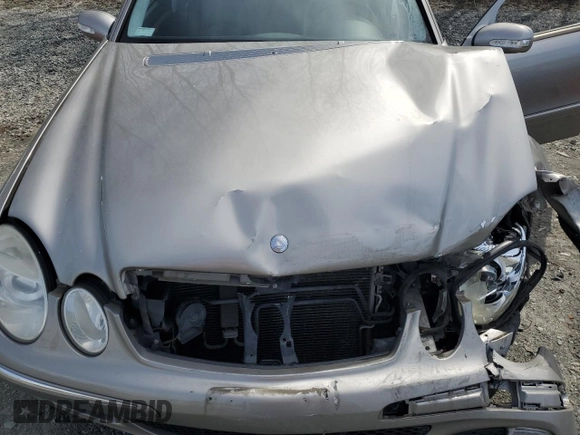 2003 Mercedes-Benz E-Class 3.2L with VIN WDBUF65J33A220573, listed as a Copart auction lot 52085375 with 142,536 mi miles and Salvage Title. Bid and sale history available at carsss.com. Image 13.