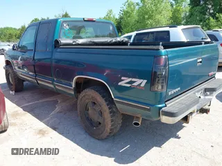 1996 GMC Sierra 1500 z VIN 1GTEK19R6TE514322, wystawiony jako IAAI lot #42253821 z przebiegiem 190 491 mil mil oraz . Historia ofert i sprzedaży dostępna na DreamBid. Obrazek 3.