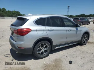 2018 BMW X1 sDrive28i z VIN WBXHU7C3XJ5H39960, wystawiony jako Copart lot #57095125 z przebiegiem 154 013 mil mil oraz Szkoda całkowita • Salvage title. Historia ofert i sprzedaży dostępna na DreamBid. Obrazek 3.